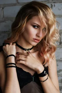 A hyper-realistic AI-generated image of a blonde woman in lingerie, showcasing the quality of character creation.