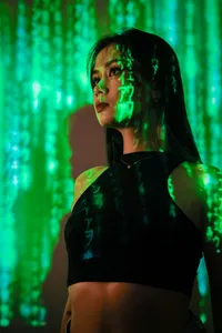 Woman interacting with digital elements, representing AI connection
